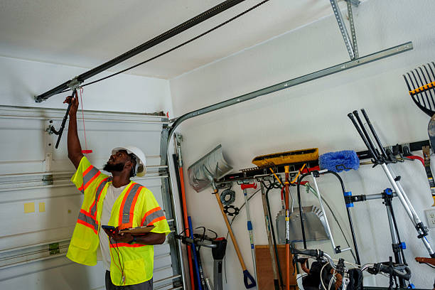 Professional Garage Door Installation technician working in Fishers, IN